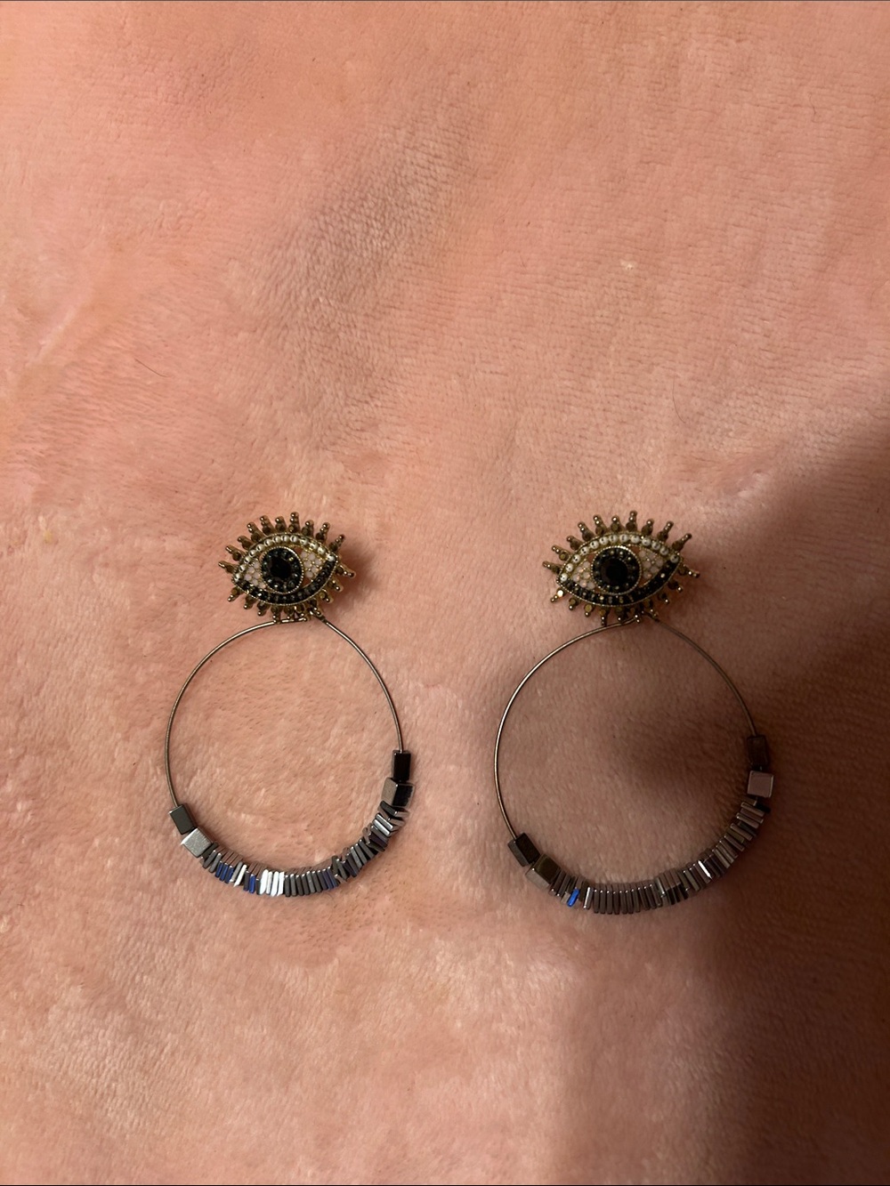 Gold Eye Hoop Earrings with Black Center Stones